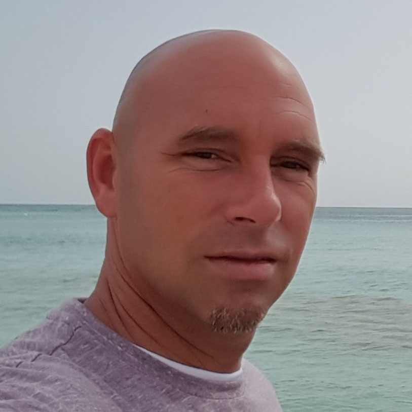 Profile picture of Chris Ziegler on the beach in Grand Cayman